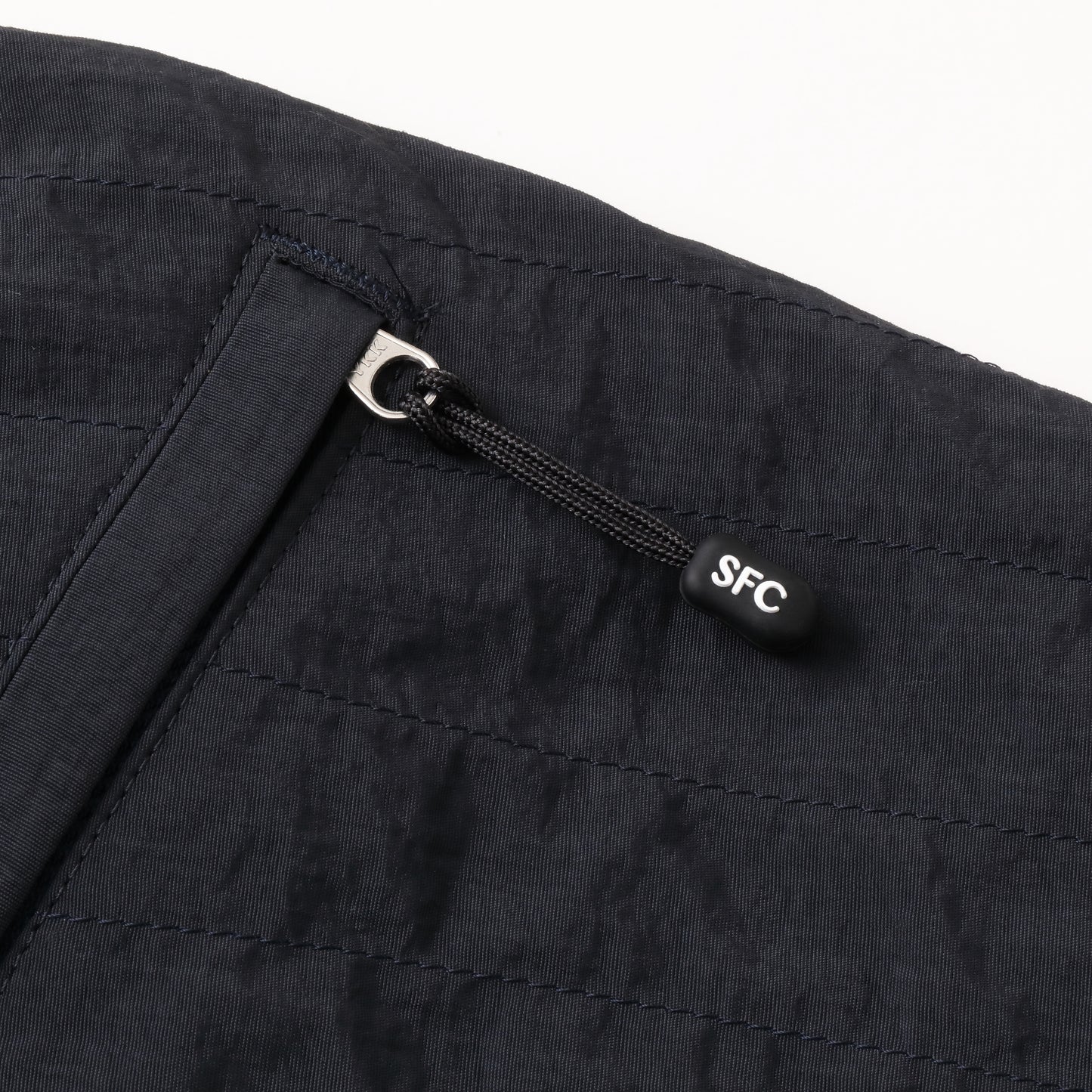 S.F.C NEW WIDE TWO TUCK PANTS (STITCHED NYLON) D NAVY【SFCFW25P06】(N)