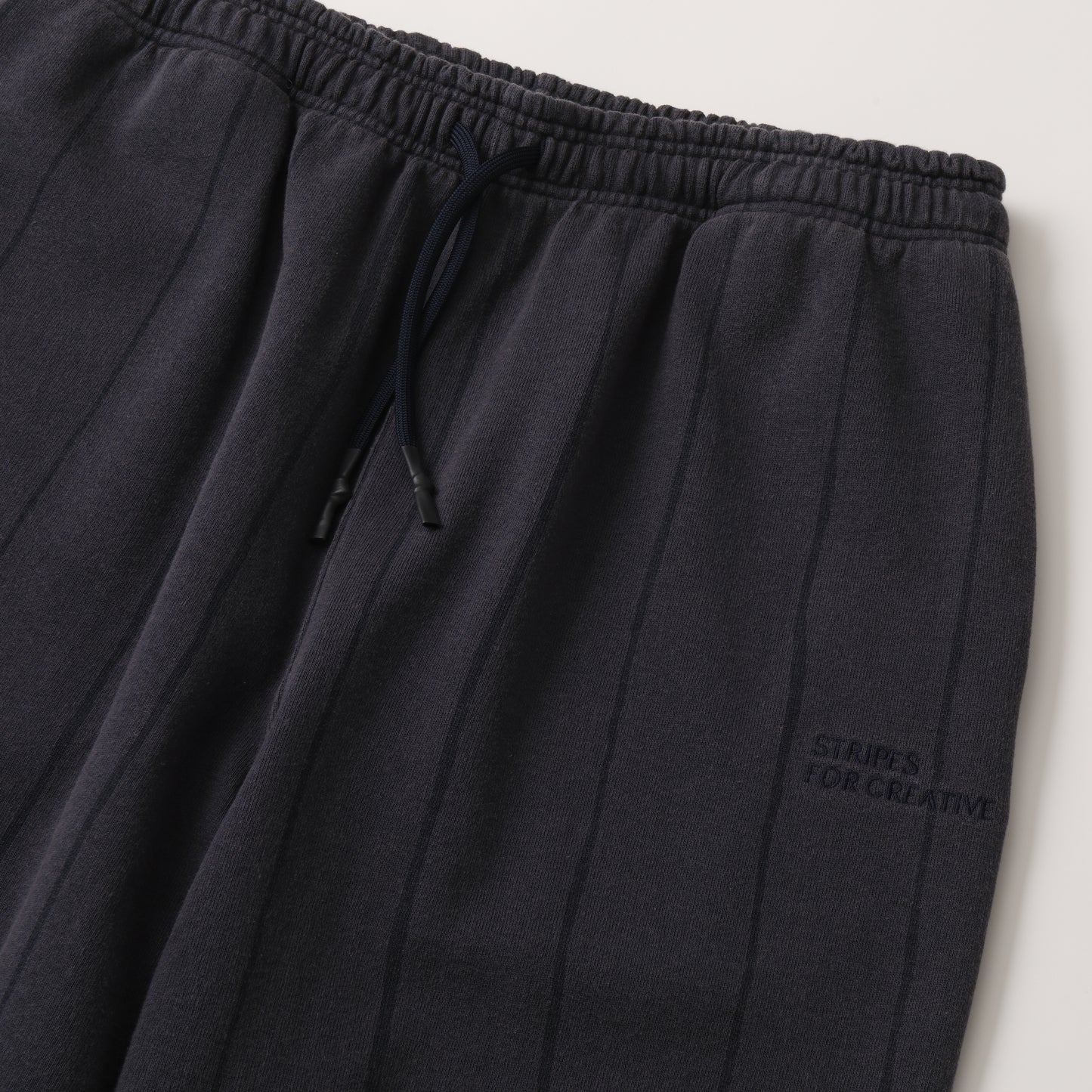 S.F.C STRIPE WIDE SWEAT PANTS (DISCHARGED) NAVY 【SFCFW25CS05】(N)
