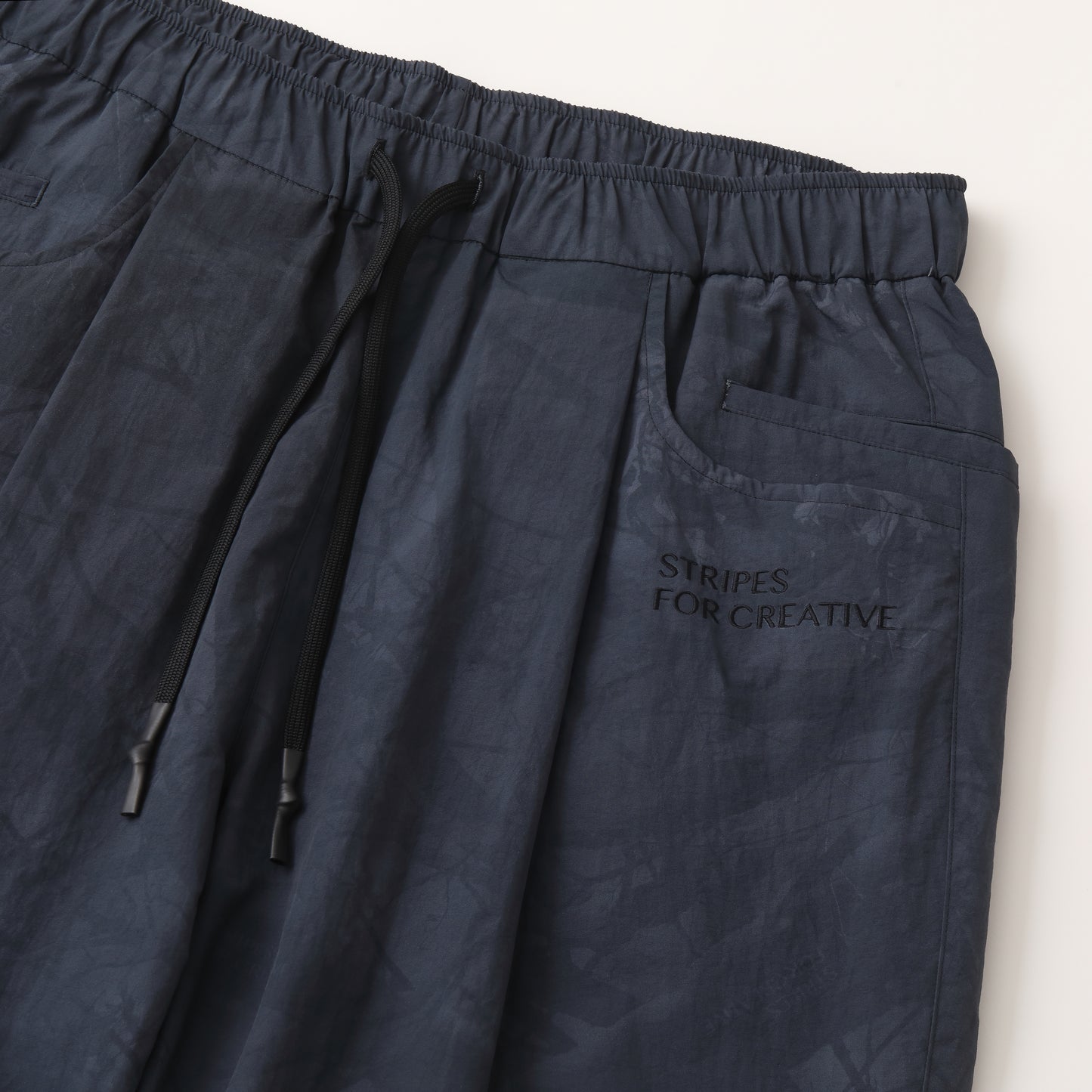 S.F.C WIDE TAPERED EASY PANTS (REAL TREE CAMO) BLACK TREE CAMO【SFCFW25P03】(N)