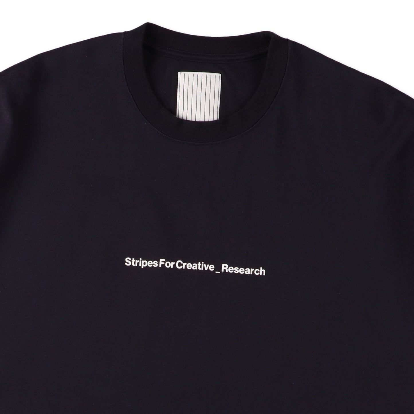 S.F.C × ADVANCED RESEARCH SUPER BIG SS TEE Navy【SFCSS25CS02AR】