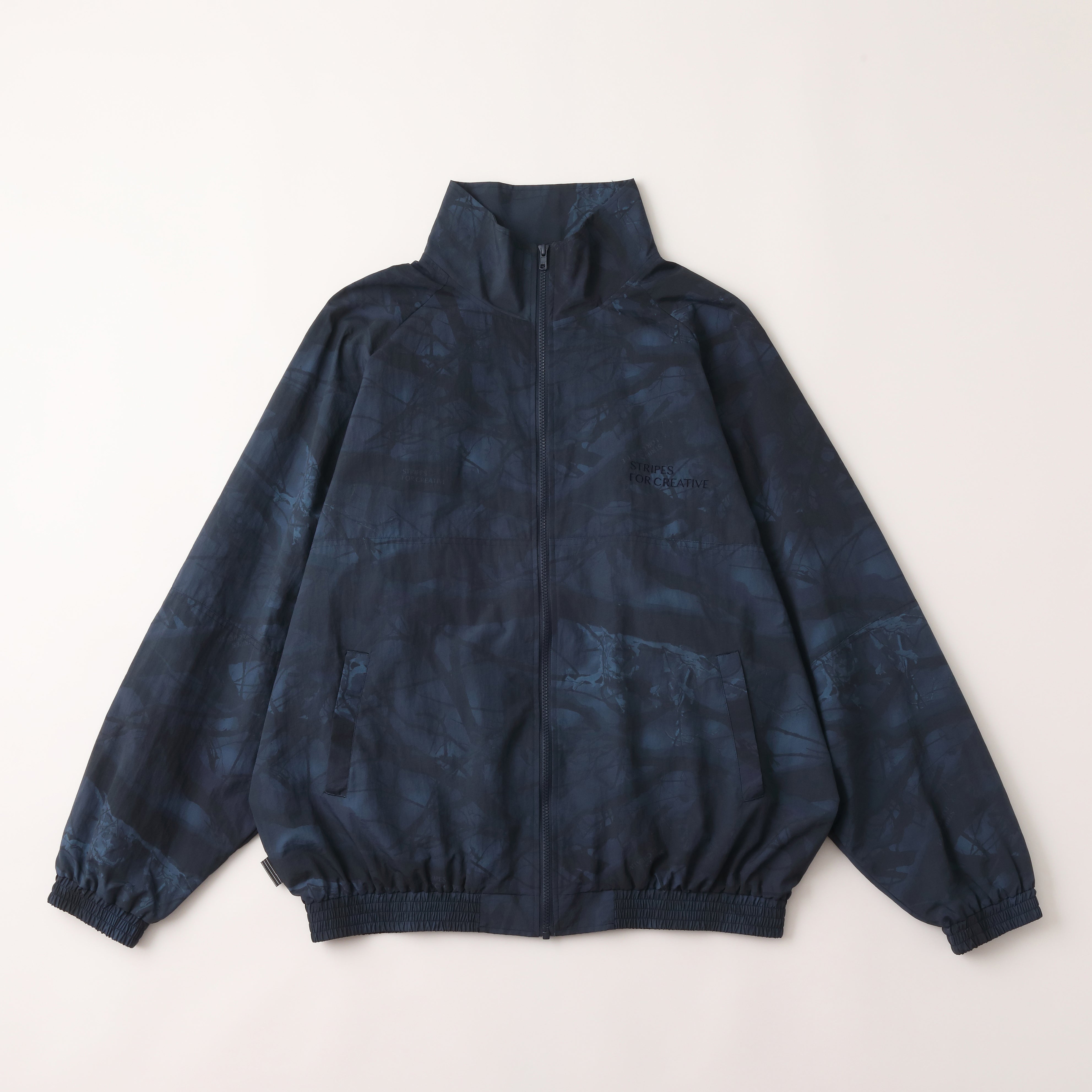 ジャケット・アウター S.F.C WINDBREAKER JACKET (REAL TREE CAMO SFC WINDBREAKER JACKET (REAL TREE CAMO) - NAVY TREE CAMO – STUDY